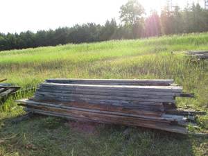 2 piles of weathered Planks & Boards