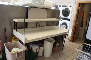 lot 90 image: Commercial Clothes Folding Table 2-tier