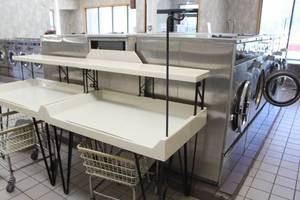 lot 103 image: Commercial Clothes Folding Table