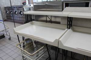 lot 104 image: Commercial Clothes Folding Table