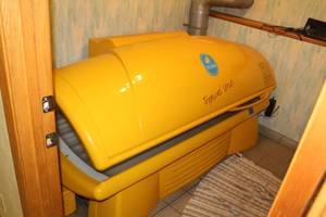 lot 128 image: 41 U.P.P. Tropical Series Tanning Bed