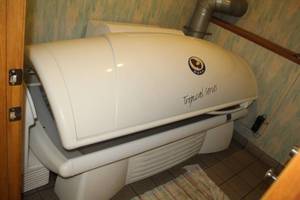 lot 129 image: 41 U.P.P. Tropical Series Tanning Bed