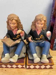 lot 14 image: Harry Potter Hermione Bookends and 2 Paperback Books