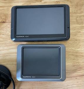lot 88 image: Garmin Nuvi GPS Units with Car and AC Adaptor 