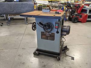 lot 28 image: DELTA 10 Unisaw Table Saw - Model 34-802 - Includes Easy Move Cart - NO SHIPPING