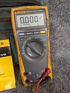 lot 275 image: Fluke Multimeter - Model 179 Includes Case and Book