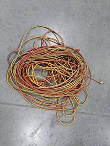 lot 454 image: Pile of Extension Cords - All need repair