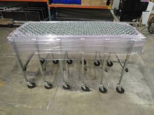 Assembly Line Roller  Has castor wheels for easy mobility  can extend to 22ft long  line wheels are metal for smooth rolling