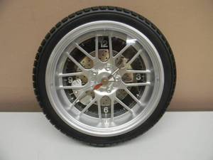 STERLING & NOBLE Tire Shaped Wall Clock Racing Man Cave Dcor - BATTERY OPERATED - NICE - SEE PICTURES