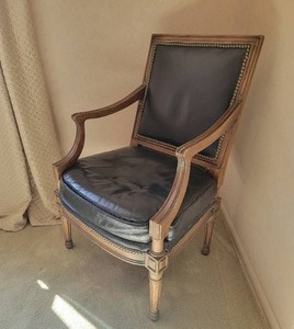 lot 61 image: Vintage Tacked Leather Carved Wood Armchair