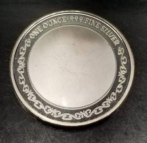 1 TROY OZ .999 FINE SILVER OFFICIAL SLUG