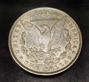 1889 MORGAN SILVER DOLLAR AU