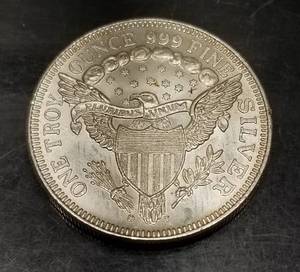 1 TROY OZ .999 FINE SILVER SEATED DOLLAR DESIGN