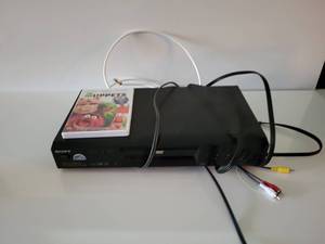 lot 61 image: Sony DVD Player & The Muppets DVD