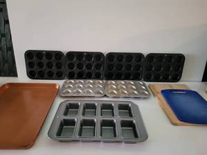 lot 103 image: Baking Pans For Cookies, Bars, Small Breads, Cup Cakes & Muffins---Two Cutting Boards