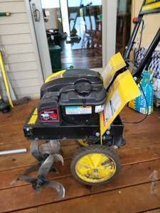 lot 109 image: Brute 725 EX--Gear Drive--Full Size Tine Rototiller
