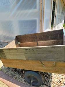 lot 145 image: Wooden Trailer On Tired Wheels
