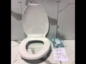 lot 1 image: CENTOCO ADA Compliant 3 in. Raised Elongated Closed Front with Cover Toilet Seat in White