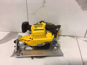 lot 16 image: DEWALT 20-Volt MAX Cordless Brushless 6-12 in. Circular Saw (Tool-Only)
