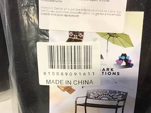 lot 25 image: Saddlebag Style Sand Weight Bag for Anchoring Patio Umbrellas by Trademark Customer return see pictures