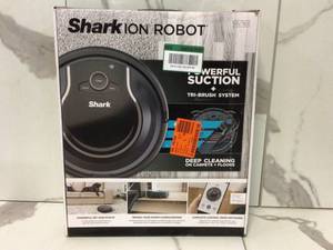 lot 38 image: Shark ION Robot Vacuum Cleaner, Multi-Surface Cleaning, Works with Alexa, and Wi-Fi Connected