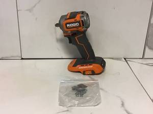 lot 69 image: RIDGID 18V SubCompact Brushless Cordless 38 in. Impact Wrench (Tool Only) with Belt Clip Customer return see pictures
