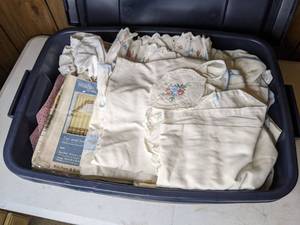 lot 308 image: Large Tub with Lid Filled with Drapes, Tablecloths and Lace