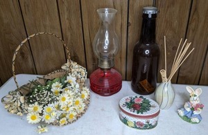 lot 301 image: Mixed Lot Kerosene Lamp, Bunny Figurine, Tin Container, Faux Flowers in Basket, Ceramic Vase with Reeds, & More
