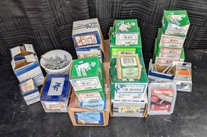 lot 53 image: Boxes of Assorted Screws, Nuts and Bolts Phillips Flat Head Wood Screws, Machine Screws, Sheet Metal Screws and More