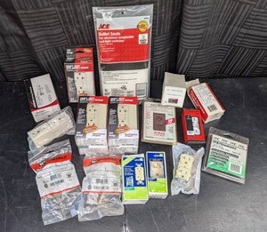 lot 54 image: Assorted Electrical Items Outlet Seals, Variety of Outlets, Circuit Breaker Replacement, and More