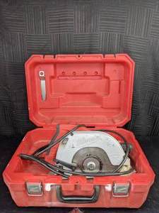 lot 12 image: Milwaukee 7-14 Tilt-Lok Adjustable Handle Circular Saw with Case