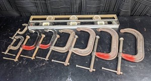 lot 31 image: Lot of 8 C-Clamps and 2 Craftsman 2-Foot Levels