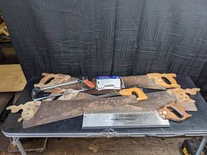lot 110 image: A Variety of Nine Different Hand Saws