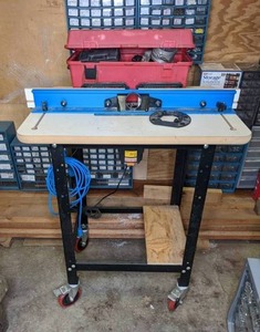 lot 23 image: Craftsman Professional 2 HP Single Speed 12-in Collet 9 Amp 12-in Router & Router Table