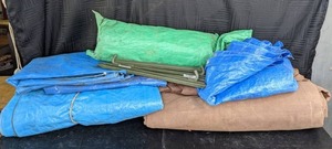 lot 66 image: Assorted Sizes of Tarps and 4 Stakes