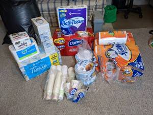 lot 208 image: Assortment of Household Essentials Napkins, Facial Tissue, Toilet Paper, Paper Towels, Paper Plates and More
