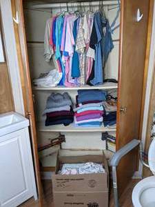 lot 204 image: Assortment of Womens Clothes Long Sleeve Tops, Short Sleeve Tops, Pajamas, Belt, Slippers and More