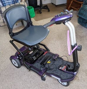 lot 8 image: EV Rider Transport Plus Foldable Scooter
