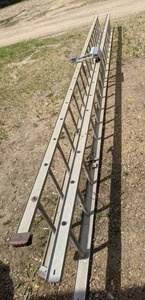 lot 153 image: Pair of 20 Ft Ladders w a QuickClick Ladder Stabilizer Attached
