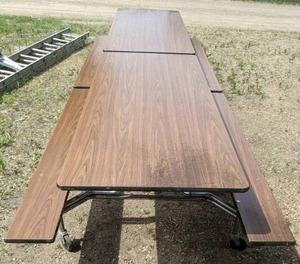 lot 79 image: One Folding Cafeteria Lunch Table with Bench Seats and Wheels