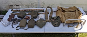 lot 275 image: Camping Supplies include Canteens, Mess Kit, Web Belts and a Vintage Backpack