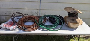 lot 273 image: An Assortment of Hoses, Cork Roll, Copper Tubing, Caulk Backing, and Clean Seal