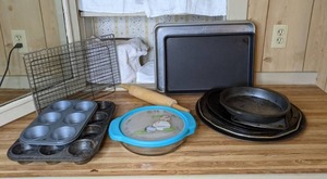 lot 365 image: Assortment of KitchenBaking Items (Muffin Tins, Wire Cooling Racks, Anchor Glass Container with Lid, Baking Sheets, Pie Tins, Pizza Pans, and more)