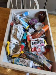 lot 238 image: Misc. Items Dap, Energizer Batteries, Tape Measurer, and More