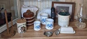 lot 218 image: Assortment of Miscellaneous Kitchen Items Paper Towel Holder, Canisters with Lids, Butter Dish, Thermos, Food Art and More