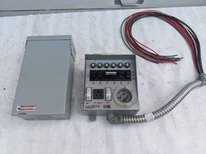 lot 407 image: Enclosed Panel Board and Honda Volt Generator Transfer Switch