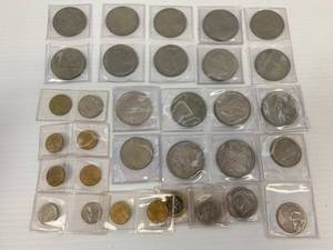lot 50 image: Group Of Vintage Foreign Coins in Protective Sleeves