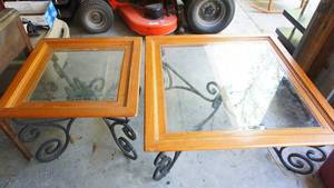 lot 27 image: Set of matching tables with beveled glass insert wrought iron base