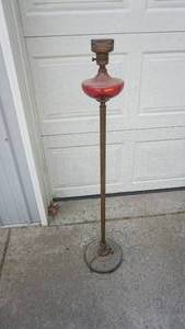 lot 100 image: Antique brass and red glass floor lamp 48 inches tall as is
