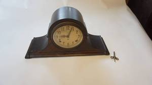 lot 120 image: Antique wood mantle clock PLYMOUTH with key works